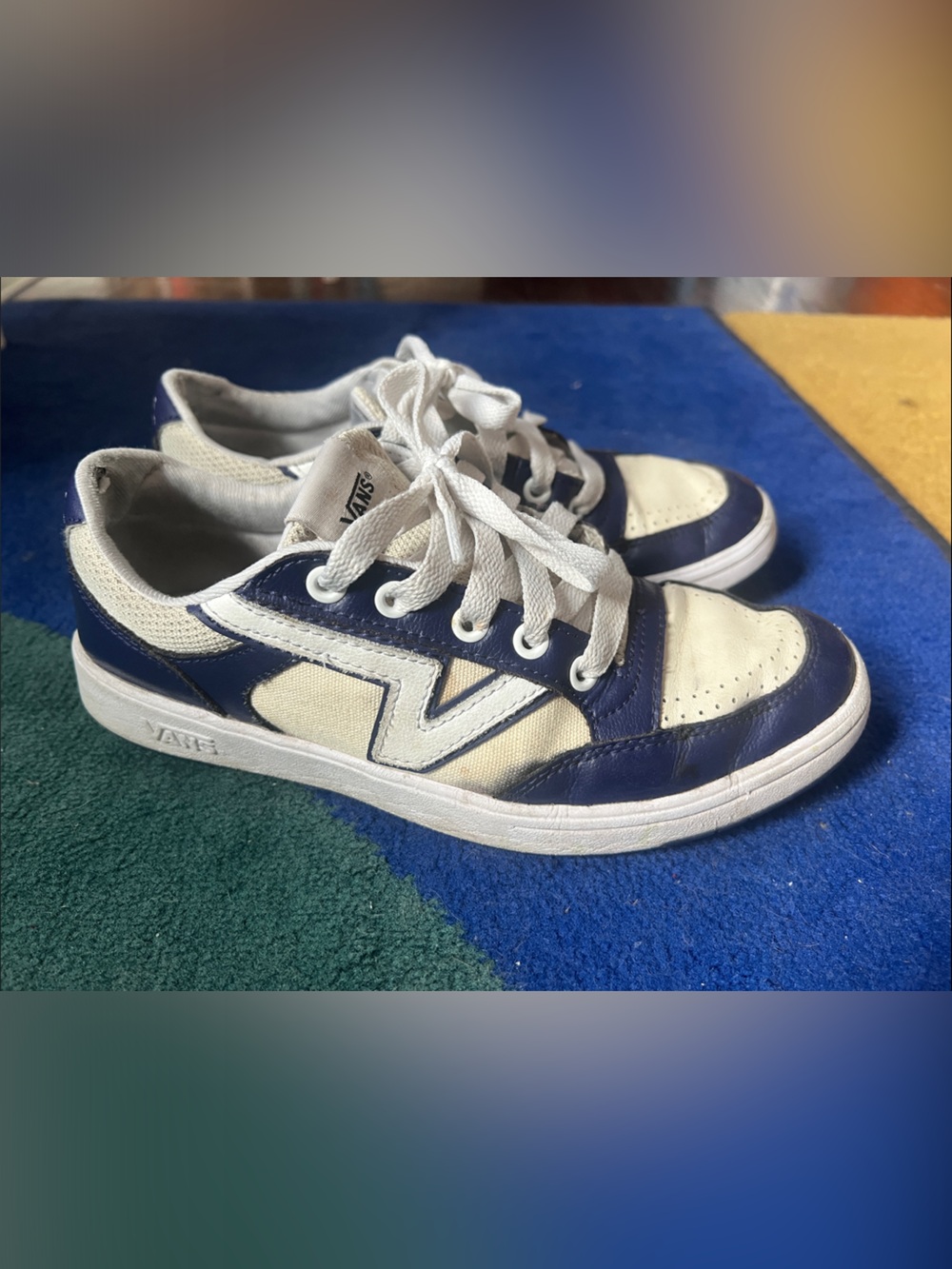 Vans Women’s 7.5 Low-Top Sneakers in Navy and Cream